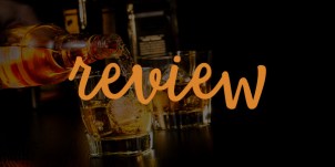 This image has an empty alt attribute; its file name is whiskey-dolls-review.jpg